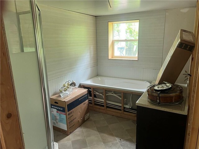 7968 County Road F, Danbury, WI 54830 - full bath featuring a garden tub, tile patterned flooring, and vanity