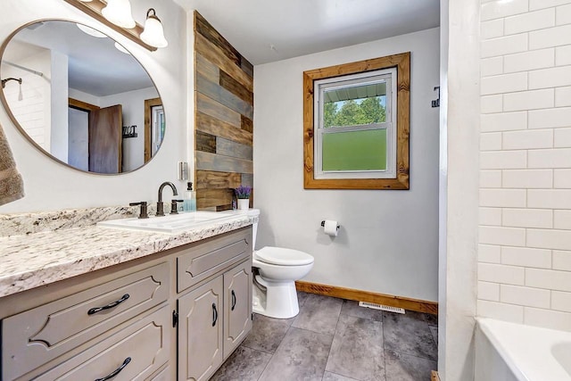 718 Fathom Pl, Sturgeon Bay, WI 54235 - full bathroom with vanity, baseboards, and toilet