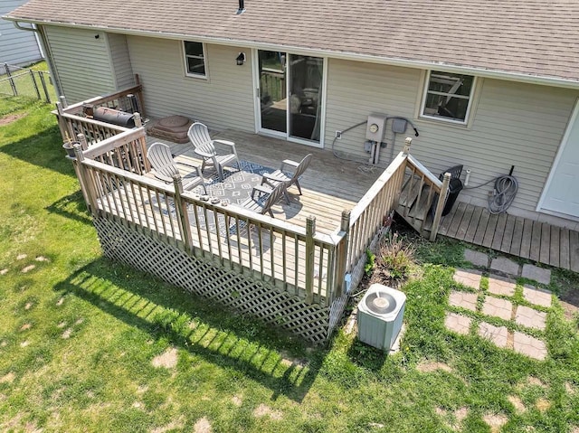 718 Fathom Pl, Sturgeon Bay, WI 54235 - wooden terrace featuring a yard and cooling unit