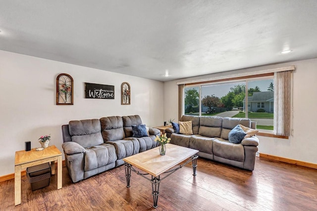 718 Fathom Pl, Sturgeon Bay, WI 54235 - living room featuring baseboards and wood finished floors