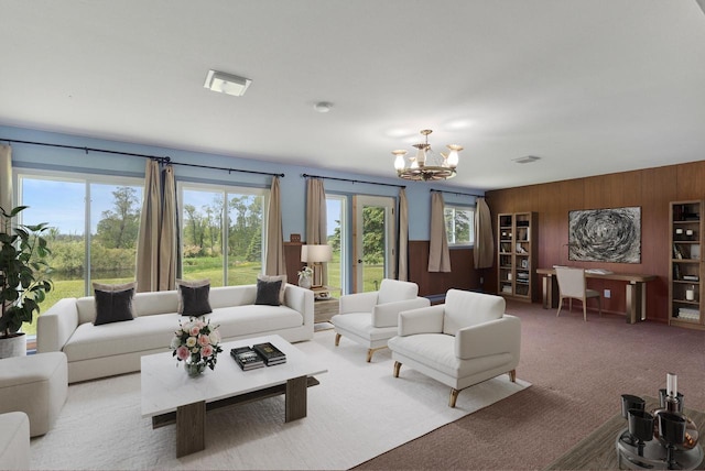2373 State Road 33, Saukville, WI 53080 - carpeted living room with wood walls and a chandelier