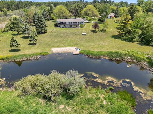 2373 State Road 33, Saukville, WI 53080 - aerial view of property and surrounding area with a nearby body of water and a heavily wooded area