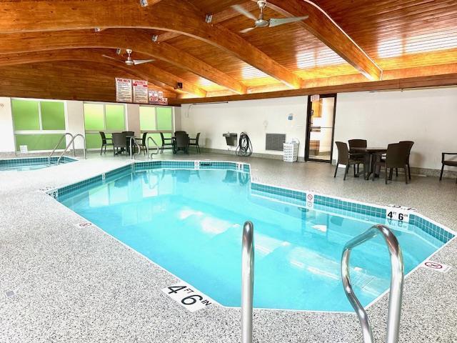 7741 State Highway 42 Unit 105, Egg Harbor, WI 54209 - indoor pool with a ceiling fan