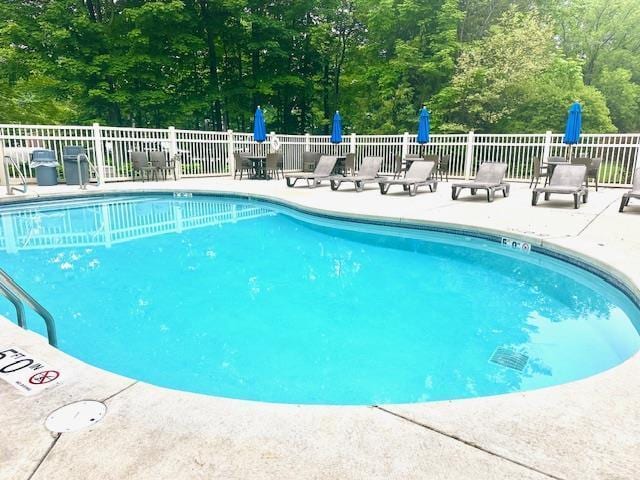 7741 State Highway 42 Unit 105, Egg Harbor, WI 54209 - community pool featuring a patio area