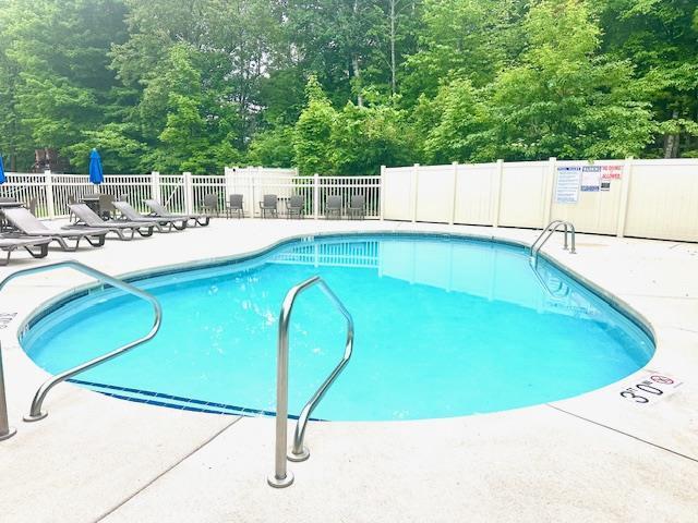 7741 State Highway 42 Unit 105, Egg Harbor, WI 54209 - community pool with a patio