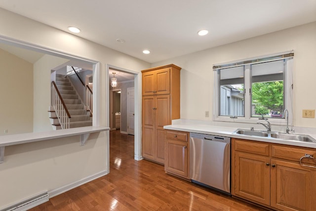 10109 N Gettysburg Ct, Mequon, WI 53092 - kitchen featuring stainless steel dishwasher, wood finished floors, light countertops, recessed lighting, and brown cabinets