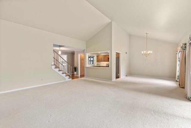 10109 N Gettysburg Ct, Mequon, WI 53092 - unfurnished living room with a chandelier, stairs, light colored carpet, and high vaulted ceiling