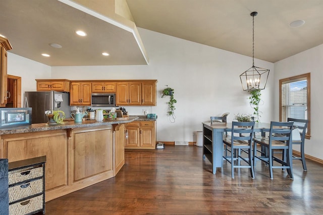 2527 W Crais Ct, De Pere, WI 54115 - kitchen featuring appliances with stainless steel finishes, baseboards, dark wood-style flooring, a chandelier, and decorative light fixtures