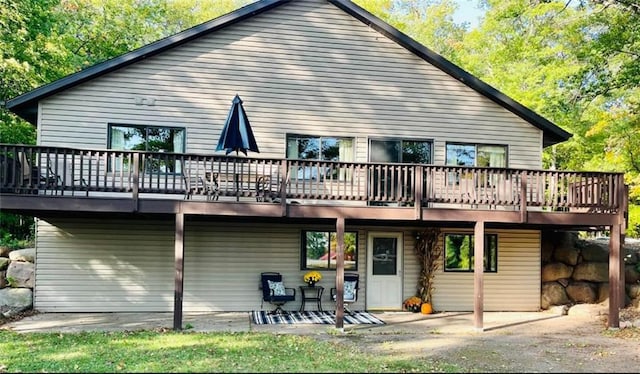 5987 Little Stone Rd, Stone Lake, WI 54876 - back of house with a patio area and a wooden deck