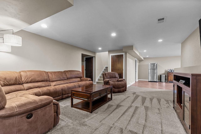 W5706 Mase Ct, Appleton, WI 54915 - living room featuring stairway, light carpet, recessed lighting, and baseboards