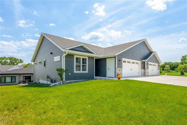 2837 Patrick John Dr, Eau Claire, WI 54703 - view of front of home with a garage, driveway, and a front yard