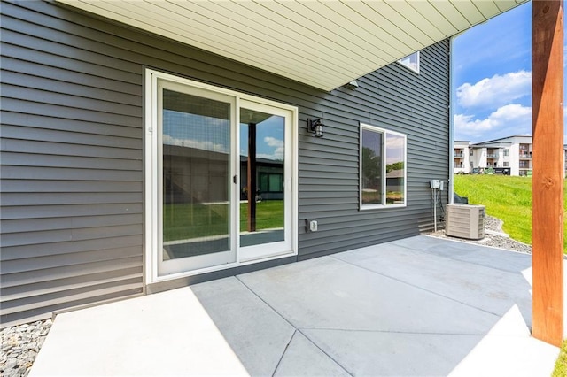 2837 Patrick John Dr, Eau Claire, WI 54703 - view of patio / terrace featuring central AC