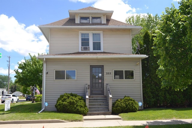 355 N Main St, Fond Du Lac, WI 54935 - american foursquare style home with a front lawn, roof with shingles, and entry steps