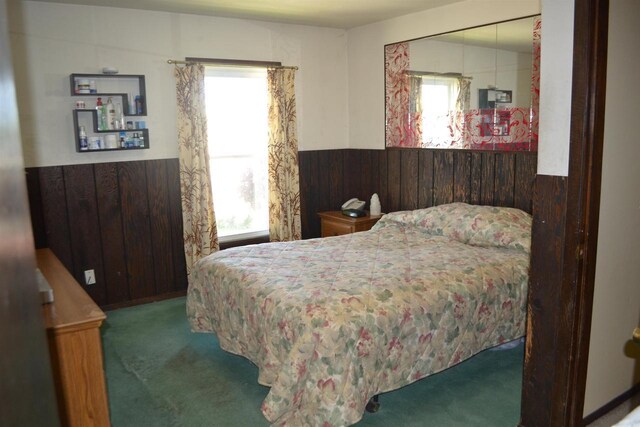 355 N Main St, Fond Du Lac, WI 54935 - carpeted bedroom featuring multiple windows and wainscoting