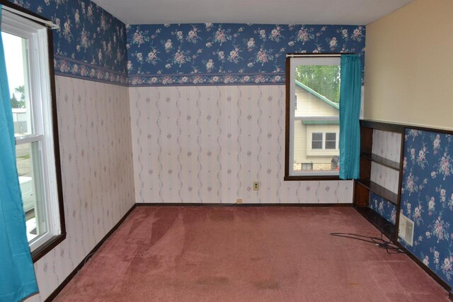 355 N Main St, Fond Du Lac, WI 54935 - carpeted empty room featuring wallpapered walls