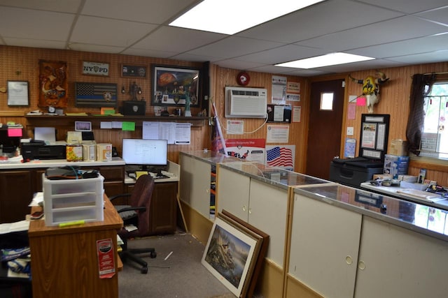 355 N Main St, Fond Du Lac, WI 54935 - office featuring a paneled ceiling, an AC wall unit, wooden walls, and carpet flooring