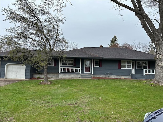 332 E Pleasant Ave, Ellsworth, WI 54011 - ranch-style house with a porch, an attached garage, a front lawn, and asphalt driveway