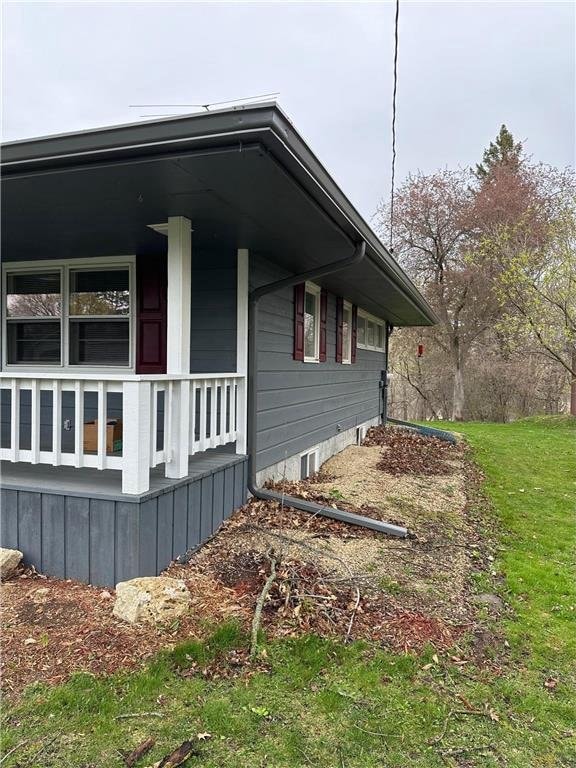 332 E Pleasant Ave, Ellsworth, WI 54011 - view of property exterior featuring a porch