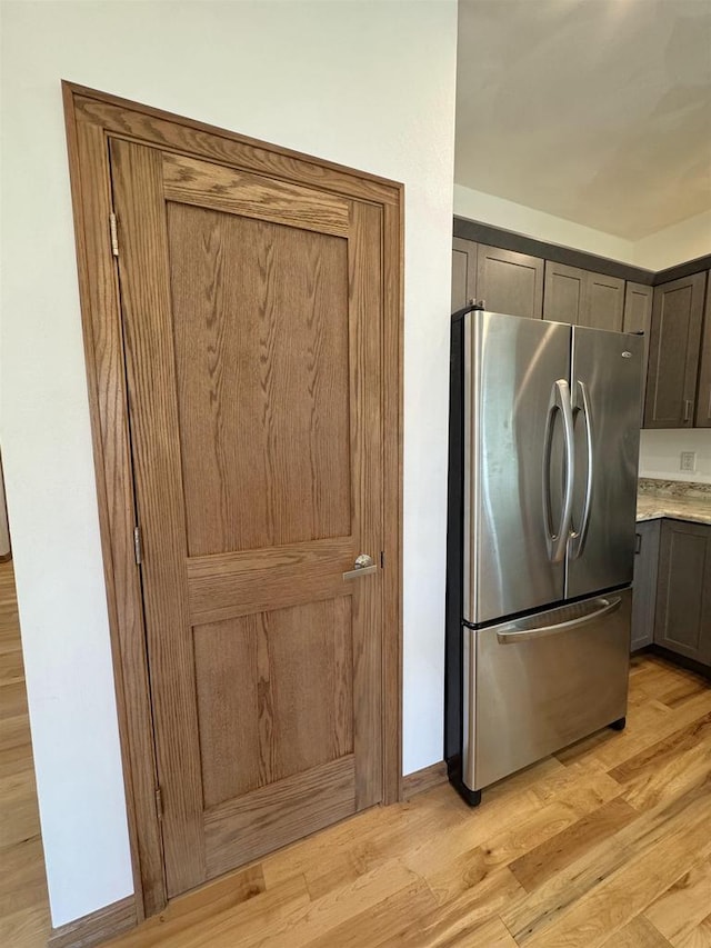 1511 16th Ave, Monroe, WI 53566 - kitchen with freestanding refrigerator and light wood-type flooring