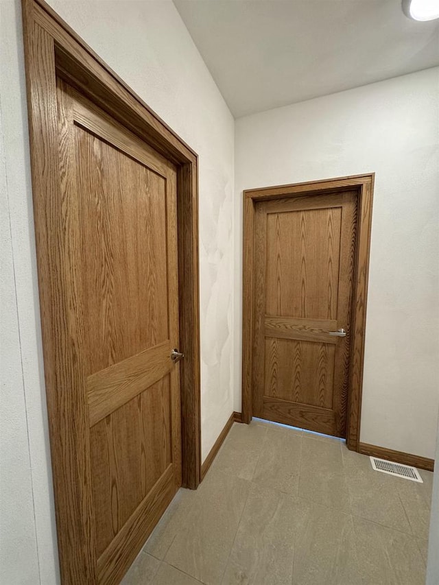 1511 16th Ave, Monroe, WI 53566 - hallway featuring baseboards