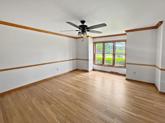 N49W31242 Old Steeple Rd, Hartland, WI 53029 - empty room featuring baseboards, ceiling fan, light wood finished floors, and crown molding