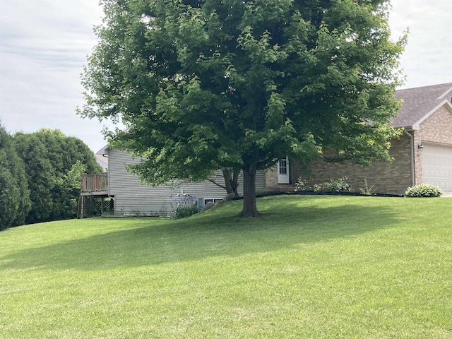 903 Rumley Run, Deforest, WI 53532 - view of grassy yard with an attached garage