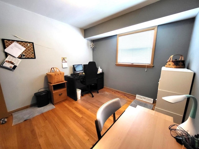 3843 S 95th St, Milwaukee, WI 53228 - home office featuring light wood-style flooring and baseboards