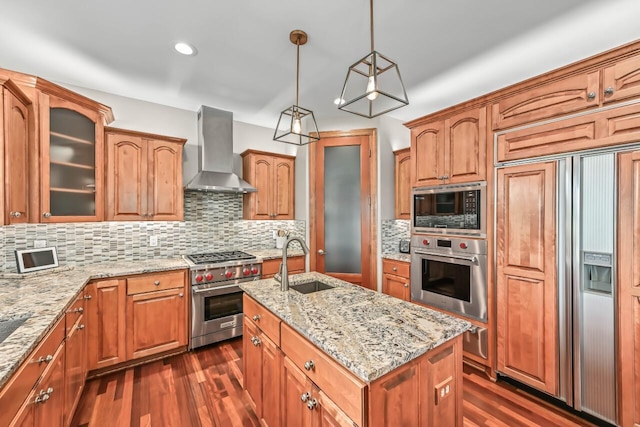 W226N3550 Wethersfield Rd, Pewaukee, WI 53072 - kitchen featuring built in appliances, wall chimney range hood, a sink, dark wood finished floors, and recessed lighting
