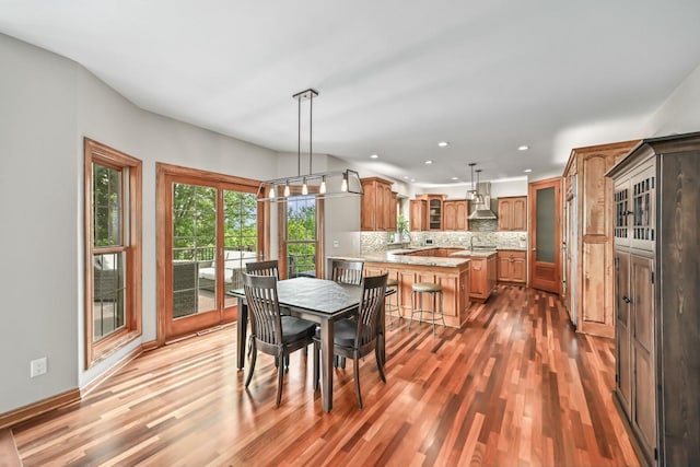 W226N3550 Wethersfield Rd, Pewaukee, WI 53072 - dining room with light wood-style floors, recessed lighting, and baseboards
