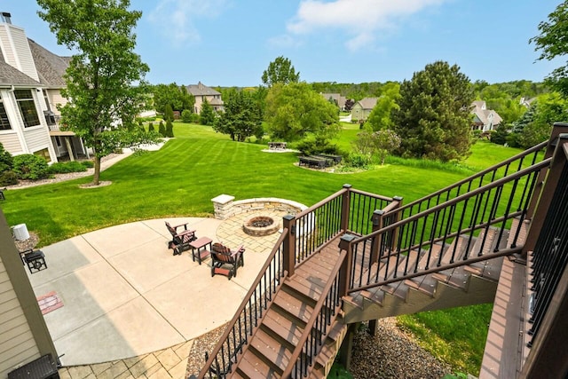 W226N3550 Wethersfield Rd, Pewaukee, WI 53072 - view of patio featuring an outdoor fire pit, stairs, and a residential view