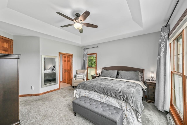 W226N3550 Wethersfield Rd, Pewaukee, WI 53072 - carpeted bedroom featuring a raised ceiling, baseboards, and a ceiling fan