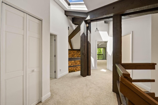 840 Woodland Ct Unit Ee-1, Fontana, WI 53125 - hall with a skylight, light colored carpet, and baseboards