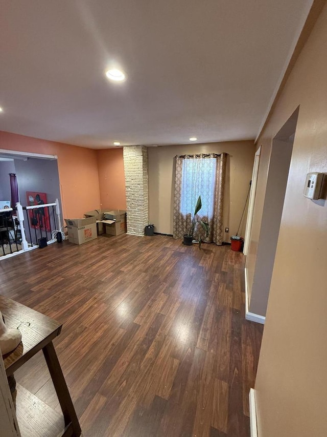 2143 Clark St, Mount Pleasant, WI 53403 - unfurnished living room featuring wood finished floors, recessed lighting, and baseboards