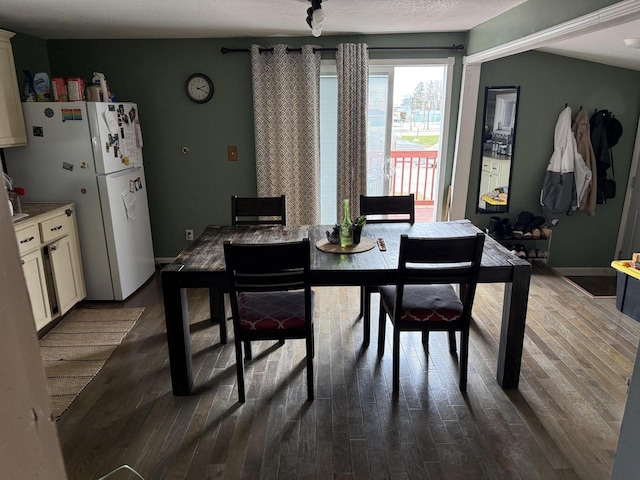 2143 Clark St, Mount Pleasant, WI 53403 - dining space with dark wood-style flooring