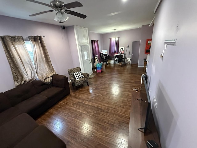 2143 Clark St, Mount Pleasant, WI 53403 - living room featuring dark wood finished floors, ceiling fan, and baseboards