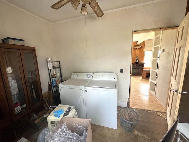 109 N Water St, Eastman, WI 54626 - washroom with independent washer and dryer, ceiling fan, ornamental molding, and light wood finished floors