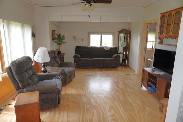 109 N Water St, Eastman, WI 54626 - living room featuring ceiling fan and crown molding