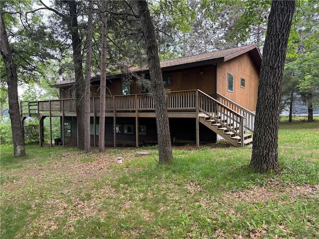 1905 Lake Rd, Barnes, WI 54873 - back of property with a deck and stairs