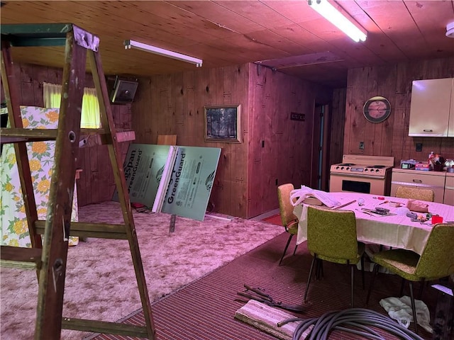 1905 Lake Rd, Barnes, WI 54873 - carpeted dining room with wood walls and wooden ceiling