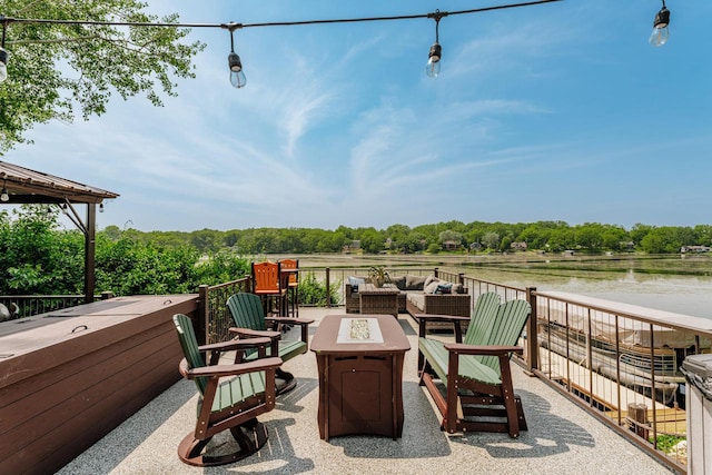 5420 W Peninsula Dr, Waterford, WI 53185 - view of patio with an outdoor living space with a fire pit and view of scattered trees