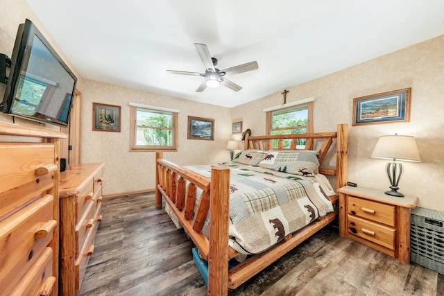 5420 W Peninsula Dr, Waterford, WI 53185 - bedroom with dark wood finished floors and ceiling fan