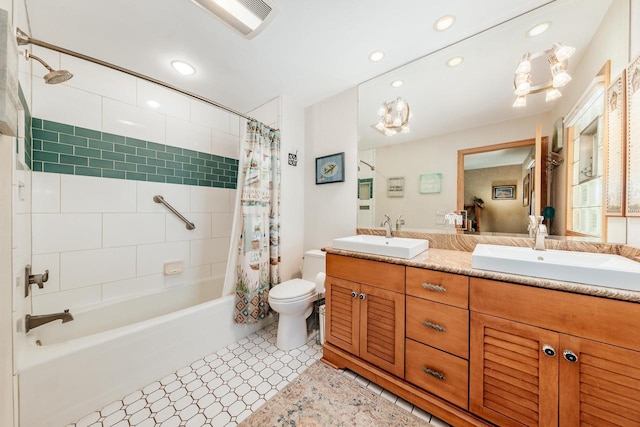 5420 W Peninsula Dr, Waterford, WI 53185 - full bath with shower / tub combo with curtain, double vanity, toilet, recessed lighting, and tile patterned floors
