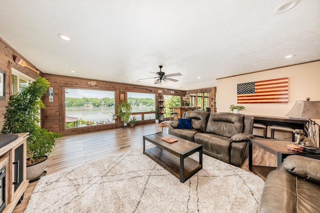 5420 W Peninsula Dr, Waterford, WI 53185 - living area featuring recessed lighting, a water view, ceiling fan, and wood finished floors