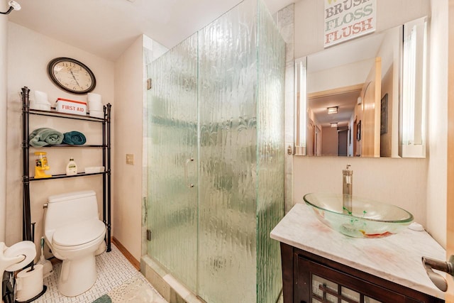 5420 W Peninsula Dr, Waterford, WI 53185 - bathroom with a stall shower, toilet, vanity, and tile patterned floors