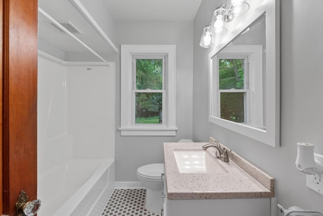 4438 County Road H Prt, Washington, WI 53074 - bathroom featuring vanity, healthy amount of natural light, toilet, and baseboards