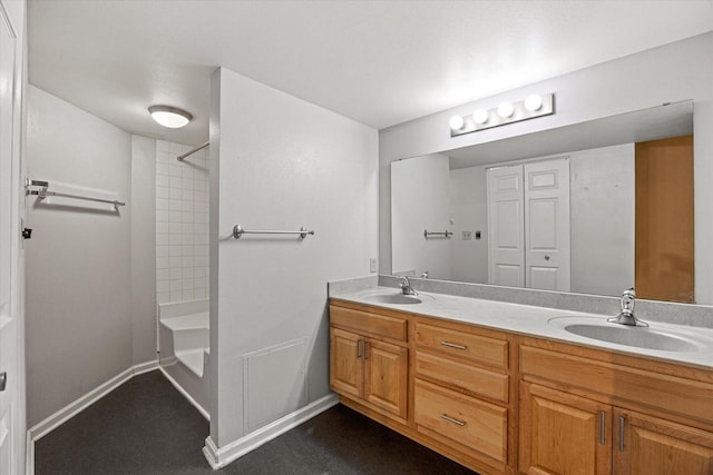 270 E Highland Ave Unit 213, Milwaukee, WI 53202 - full bath with double vanity, shower / washtub combination, and baseboards