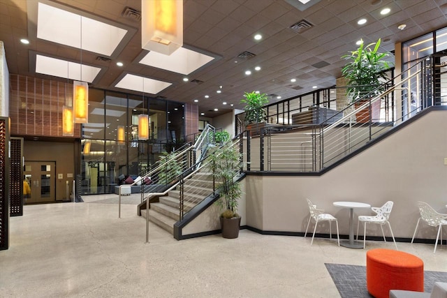 270 E Highland Ave Unit 213, Milwaukee, WI 53202 - community lobby featuring stairway and recessed lighting