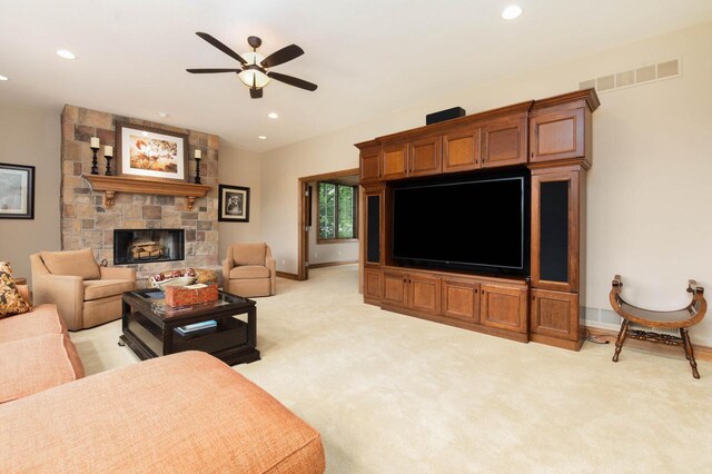1252 Mary Hill Cir, Hartland, WI 53029 - living room with ceiling fan, recessed lighting, light carpet, a stone fireplace, and baseboards