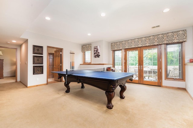 1252 Mary Hill Cir, Hartland, WI 53029 - rec room with light colored carpet, french doors, baseboards, and recessed lighting