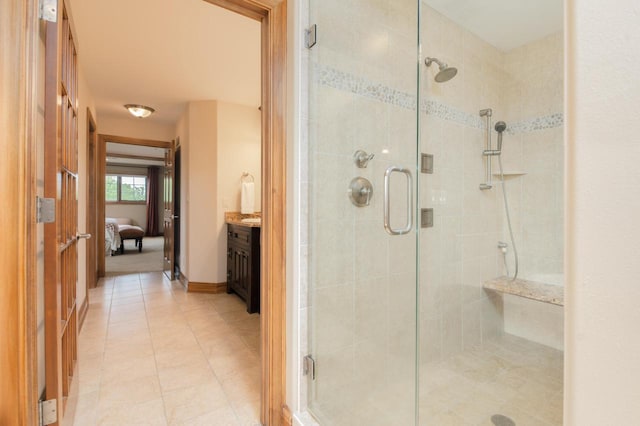 1252 Mary Hill Cir, Hartland, WI 53029 - full bath with a stall shower, ensuite bathroom, vanity, and tile patterned flooring